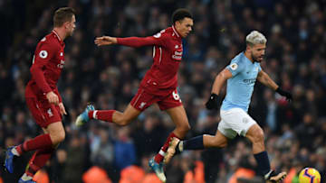 MANCHESTER, ENGLAND - JANUARY 03: Sergio Aguero of Manchester City is challenged by Trent Alexander-Arnold of Liverpool during the Premier League match between Manchester City and Liverpool FC at the Etihad Stadium on January 3, 2019 in Manchester, United Kingdom. (Photo by Shaun Botterill/Getty Images)