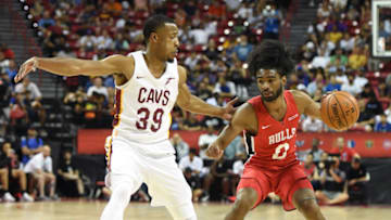 LAS VEGAS, NEVADA - JULY 07: Coby White #0 of the Chicago Bulls brings the ball up the court against Muhammad-Ali Abdur-Rahkman #39 of the Cleveland Cavaliers during the 2019 NBA Summer League at the Thomas & Mack Center on July 7, 2019 in Las Vegas, Nevada. NOTE TO USER: User expressly acknowledges and agrees that, by downloading and or using this photograph, User is consenting to the terms and conditions of the Getty Images License Agreement. (Photo by Ethan Miller/Getty Images)