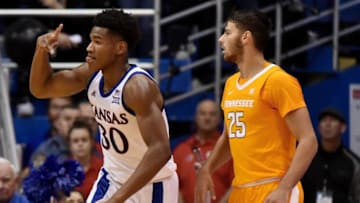 LAWRENCE, KANSAS - JANUARY 25: Ochai Agbaji #30 of the Kansas Jayhawks celebrates a shot against Santiago Vescovi #25 of the Tennessee Volunteers in the second half at Allen Fieldhouse on January 25, 2020 in Lawrence, Kansas. (Photo by Ed Zurga/Getty Images)