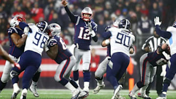 FOXBOROUGH, MASSACHUSETTS - JANUARY 04: Tom Brady #12 of the New England Patriots throws a pass in the AFC Wild Card Playoff game against the Tennessee Titans at Gillette Stadium on January 04, 2020 in Foxborough, Massachusetts. (Photo by Adam Glanzman/Getty Images)
