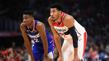 LOS ANGELES, CA - OCTOBER 28: Washington Wizards Forward Otto Porter Jr. (22) and Los Angeles Clippers Guard Shai Gilgeous-Alexander (2) look on during a NBA game between the Washington Wizards and the Los Angeles Clippers on October 28, 2018 at STAPLES Center in Los Angeles, CA. (Photo by Brian Rothmuller/Icon Sportswire via Getty Images)