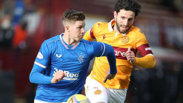 MOTHERWELL, SCOTLAND - JANUARY 17: Cedric Itten of Rangers vies with Ricki Lamie of Motherwell during the Ladbrokes Scottish Premiership match between Motherwell and Rangers at Fir Park on January 17, 2021 in Motherwell, Scotland. Sporting stadiums around Scotland remain under strict restrictions due to the Coronavirus Pandemic as Government social distancing laws prohibit fans inside venues resulting in games being played behind closed doors. (Photo by Ian MacNicol/Getty Images)