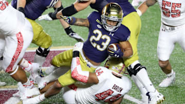 CHESTNUT HILL, MASSACHUSETTS - NOVEMBER 14: Brandon Barlow #44 of the Boston College Eagles tackles Kyren Williams #23 of the Notre Dame Fighting Irish at Alumni Stadium on November 14, 2020 in Chestnut Hill, Massachusetts. (Photo by Maddie Meyer/Getty Images)