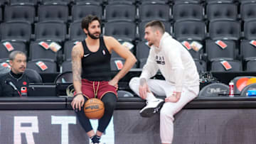 TORONTO, ON - NOVEMBER 28: Ricky Rubio #13 of the Cleveland Cavaliers speaks with Juancho Hernangomez #41 of the Toronto Raptors before their basketball game at the Scotiabank Arena on November 28, 2022 in Toronto, Ontario, Canada. NOTE TO USER: User expressly acknowledges and agrees that, by downloading and/or using this Photograph, user is consenting to the terms and conditions of the Getty Images License Agreement. (Photo by Mark Blinch/Getty Images)