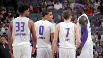 SACRAMENTO, CA - JULY 1: Hollis Thompson #33, Justin James #0, Kyle Guy #7, and Wenyen Gabriel #32 of Sacramento Kings look on during the game against the Golden State Warriors on July 1, 2019 at the Golden 1 Center, in Phoenix, Arizona. NOTE TO USER: User expressly acknowledges and agrees that, by downloading and or using this photograph, User is consenting to the terms and conditions of the Getty Images License Agreement. Mandatory Copyright Notice: Copyright 2019 NBAE (Photo by Rocky Widner/NBAE via Getty Images)