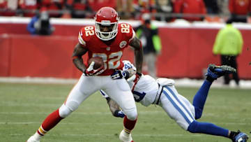 Dec 22, 2013; Kansas City, MO, USA; Kansas City Chiefs wide receiver Dwayne Bowe (82) escapes the grasp of Indianapolis Colts strong safety Antoine Bethea (41) in the first half at Arrowhead Stadium. Indianapolis won the game 23-7. Mandatory Credit: John Rieger-USA TODAY Sports