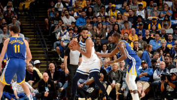 OAKLAND, CA - NOVEMBER 2: Karl-Anthony Towns #32 of the Minnesota Timberwolves handles the ball against the Golden State Warriors on November 2, 2018 at ORACLE Arena in Oakland, California. NOTE TO USER: User expressly acknowledges and agrees that, by downloading and or using this photograph, User is consenting to the terms and conditions of the Getty Images License Agreement. Mandatory Copyright Notice: Copyright 2018 NBAE (Photo by Noah Graham/NBAE via Getty Images)