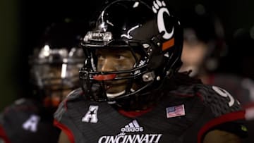 Nov 13, 2014; Cincinnati, OH, USA; Cincinnati Bearcats defensive lineman Silverberry Mouhon (92) against the East Carolina Pirates at Nippert Stadium. The Bearcats won 52-37. Mandatory Credit: Aaron Doster-USA TODAY Sports