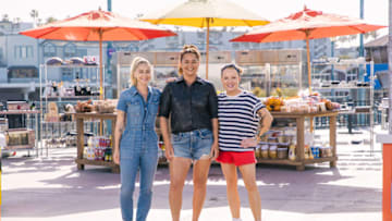 West Coast team leader Brooke Williamson, Host Antonia Lofaso and East Coast team leader Tiffani Faison, portrait, as seen on Beachside Brawl, Season 1. Photo provided by Food Network