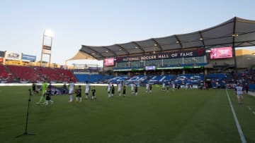 Aug 2, 2023; Frisco, TX, USA; FC Dallas and Mazatlan FC walk onto the field with the player escorts before the game at Toyota Stadium. Mandatory Credit: Jerome Miron-USA TODAY Sports