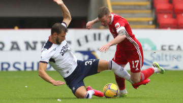 Jonathan Hayes of Aberdeen is challenged by Borna Barisic of Rangers FC. (Photo by Andrew Milligan/Pool via Getty Images)