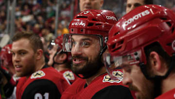 GLENDALE, ARIZONA - JANUARY 02: Brad Richardson #15 of the Arizona Coyotes celebrates with teammates on the bench after scoring a goal against the Anaheim Ducks during the third period of the NHL hockey game at Gila River Arena on January 02, 2020 in Glendale, Arizona. (Photo by Norm Hall/NHLI via Getty Images)