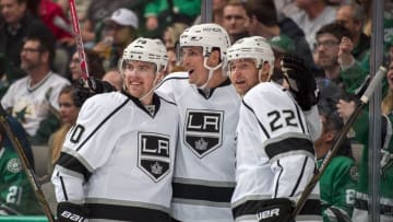 Mar 15, 2016; Dallas, TX, USA; Los Angeles Kings center Vincent Lecavalier (44) and center Trevor Lewis (22) and right wing Kris Versteeg (10) celebrate the goal by Lewis against the Dallas Stars during the second period at the American Airlines Center. Mandatory Credit: Jerome Miron-USA TODAY Sports