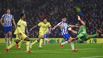 BRIGHTON, ENGLAND - OCTOBER 02: Aaron Ramsdale of Arsenal makes a save from Neal Maupay of Brighton & Hove Albion during the Premier League match between Brighton & Hove Albion and Arsenal at American Express Community Stadium on October 02, 2021 in Brighton, England. (Photo by Mike Hewitt/Getty Images)