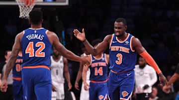 NEW YORK, NY - OCTOBER 03: Tim Hardaway Jr. #3 of the New York Knicks celebrates with teammate Lance Thomas #42 during the preseason game against the Brooklyn Nets at Barclays Center on October 3, 2018 in the Brooklyn borough of New York City. NOTE TO USER: User expressly acknowledges and agrees that, by downloading and or using this photograph, User is consenting to the terms and conditions of the Getty Images License Agreement. (Photo by Matteo Marchi/Getty Images)