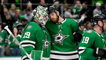 Apr 6, 2023; Dallas, Texas, USA; Dallas Stars goaltender Jake Oettinger (29) and defenseman Jani Hakanpaa (2) celebrate after the Stars victory over the Philadelphia Flyers at the American Airlines Center. Mandatory Credit: Jerome Miron-USA TODAY Sports