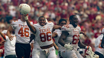 DALLAS, TX - OCTOBER 06: Texas Longhorns bench rushes onto the field to celebrate winning the Big 12 Conference Red River Rivalry game against the Oklahoma Sooners on October 6, 2018 at Cotton Bowl Stadium in Dallas, Texas. (Photo by William Purnell/Icon Sportswire via Getty Images)