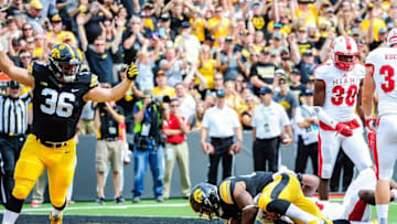 Sep 3, 2016; Iowa City, IA, USA; Iowa Hawkeyes running back LeShun Daniels Jr. (29) scores a touchdown as fullback Brady Ross (36) celebrates during the first quarter at Kinnick Stadium. Mandatory Credit: Jeffrey Becker-USA TODAY Sports