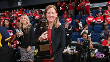 WASHINGTON, DC - SEPTEMBER 19: WNBA Commissioner Cathy Engelbert poses for a photo with the WNBA MVP trophy during Game Two of the WNBA Semi Finals on September 19, 2019 at the St. Elizabeths East Entertainment and Sports Arena in Washington, DC. NOTE TO USER: User expressly acknowledges and agrees that, by downloading and or using this photograph, User is consenting to the terms and conditions of the Getty Images License Agreement. Mandatory Copyright Notice: Copyright 2019 NBAE (Photo by Ned Dishman/NBAE via Getty Images)