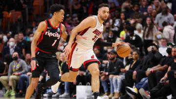 Max Strus #31 of the Miami Heat dribbles against Anfernee Simons #1 of the Portland Trail Blazers (Photo by Michael Reaves/Getty Images)