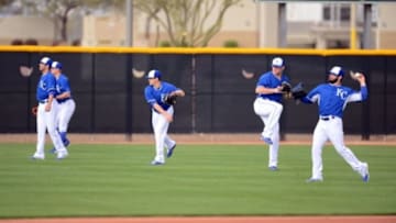 Feb 23, 2015; Surprise, AZ, USA; Kansas City Royals pitchers throw during a workout at Surprise Stadium. Mandatory Credit: Joe Camporeale-USA TODAY Sports