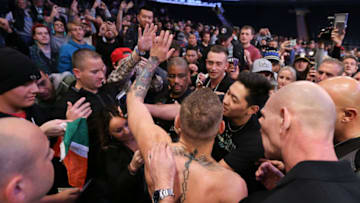 NEW YORK, NY - NOVEMBER 09: UFC Featherweight Champion Conor McGregor high fives fans after UFC 205 Open Workouts at Madison Square Garden on November 9, 2016 in New York City. (Photo by Michael Reaves/Getty Images)