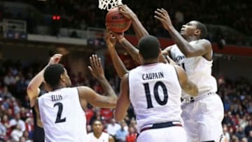Feb 13, 2016; Cincinnati, OH, USA; Cincinnati Bearcats forward Gary Clark (11) grabs the loose ball against the East Carolina Pirates in the second half at Fifth Third Arena. The Bearcats won 75-60. Mandatory Credit: Aaron Doster-USA TODAY Sports