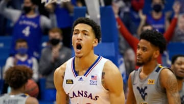 Dec 22, 2020; Lawrence, Kansas, USA; Kansas Jayhawks forward Jalen Wilson (10) celebrates after making a three point basket against the West Virginia Mountaineers during the second half at Allen Fieldhouse. Mandatory Credit: Denny Medley-USA TODAY Sports