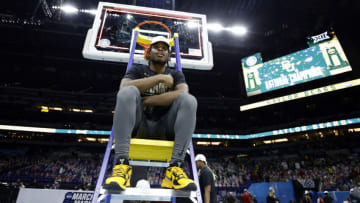 INDIANAPOLIS, INDIANA - APRIL 05: Davion Mitchell #45 of the Baylor Bears sits on a ladder with the trophy after defeating the Gonzaga Bulldogs in the National Championship game of the 2021 NCAA Men's Basketball Tournament at Lucas Oil Stadium on April 05, 2021 in Indianapolis, Indiana. The Baylor Bears defeated the Gonzaga Bulldogs 86-70. (Photo by Tim Nwachukwu/Getty Images)