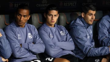 MUNICH, GERMANY - APRIL 12: Danilo Luiz da Silva, James Rodriguez, Alvaro Morata of Real Madrid seat on the bench during the UEFA Champions League Quarter Final first leg match between FC Bayern Muenchen (Bayern Munich) and Real Madrid CF at Allianz Arena on April 12, 2017 in Munich, Germany. (Photo by Jean Catuffe/Getty Images)
