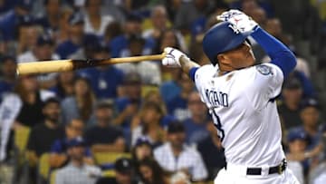 LOS ANGELES, CA - SEPTEMBER 22: Manny Machado #8 of the Los Angeles Dodgers hits a three-run home run in the third inning against the San Diego Padres at Dodger Stadium on September 22, 2018 in Los Angeles, California. (Photo by Jayne Kamin-Oncea/Getty Images)