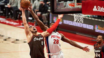 Portland Trail Blazers center Enes Kanter (11) pulls down a rebound against Detroit Pistons Credit: Troy Wayrynen-USA TODAY Sports