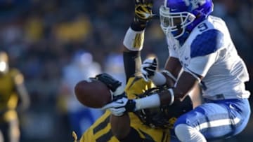 Nov 1, 2014; Columbia, MO, USA; Missouri Tigers defensive back Aarion Penton (11) breaks up a pass intended for Kentucky Wildcats wide receiver Demarco Robinson (9) during the second half at Faurot Field. Missouri won 20-10. Mandatory Credit: Denny Medley-USA TODAY Sports