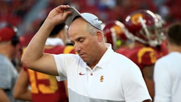 LOS ANGELES, CALIFORNIA - NOVEMBER 23: Head coach Clay Helton of the USC Trojans looks on after defeating the UCLA Bruins 52-35 in a game at Los Angeles Memorial Coliseum on November 23, 2019 in Los Angeles, California. (Photo by Sean M. Haffey/Getty Images)