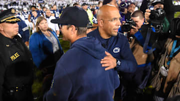Michigan Wolverines head coach Jim Harbaugh (left) and Penn State Nittany Lions head coach James Franklin (Mandatory Credit: Rich Barnes-USA TODAY Sports)