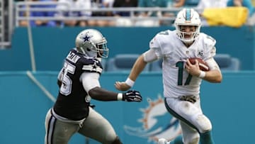 Nov 22, 2015; Miami Gardens, FL, USA; Dallas Cowboys linebacker Rolando McClain (55) chases Miami Dolphins quarterback Ryan Tannehill (17) in the first half at Sun Life Stadium. The Cowboys won 24-14. Mandatory Credit: Andrew Innerarity-USA TODAY Sports