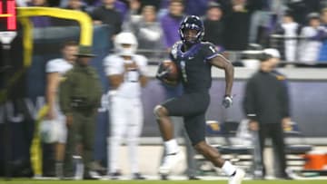 FORT WORTH, TX - NOVEMBER 29: Jalen Reagor #1 of the TCU Horned Frogs returns a punt for a touchdown against the West Virginia Mountaineers in the second half at Amon G. Carter Stadium on November 29, 2019 in Fort Worth, Texas. West Virginia won 20-17. (Photo by Ron Jenkins/Getty Images)