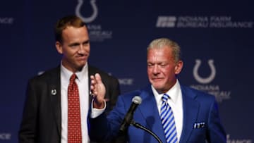 Mar 18, 2016; Indianapolis, IN, USA; Indianapolis Colts owner Jim Irsay speaks with retired quarterback Peyton Manning standing behind him during a press conference at Indiana Farm Bureau Football Center. Mandatory Credit: Brian Spurlock-USA TODAY Sports