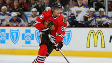 Dec 3, 2014; Chicago, IL, USA; Chicago Blackhawks right wing Patrick Kane (88) with the puck during the second period against the St. Louis Blues at the United Center. Mandatory Credit: Dennis Wierzbicki-USA TODAY Sports