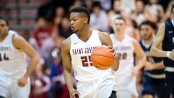 PHILADELPHIA, PA - DECEMBER 30: Saint Joe's Forward James Demery (25) carries the ball in the first half during the game between the George Washington Colonials and Saint Joseph's Hawks on December 30, 2016 at Hagan Arena in Philadelphia, PA. (Photo by Kyle Ross/Icon Sportswire via Getty Images)