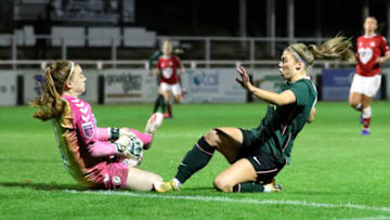 BRISTOL, ENGLAND - NOVEMBER 14: Rianna Dean of Tottenham Hotspur and Sophie Baggaley of Bristol City clash (Photo by Naomi Baker/Getty Images)