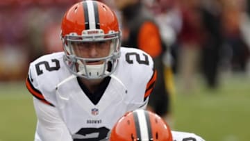 Aug 18, 2014; Landover, MD, USA; Cleveland Browns quarterback Johnny Manziel (2) takes a snap during warmups prior to the Browns