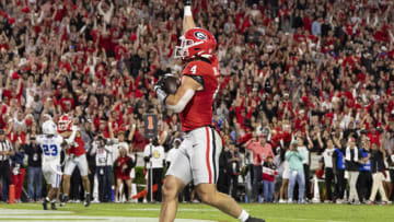 ATHENS, GA - OCTOBER 7: Oscar Delp #4 of the Georgia Bulldogs celebrates aa touchdown during a game between University of Kentucky and University of Georgia at Sanford Stadium on October 7, 2023 in Athens, Georgia. (Photo by Steve Limentani/ISI Photos/Getty Images)
