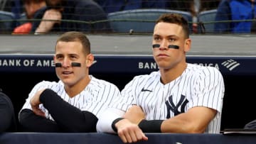 NEW YORK, NEW YORK - OCTOBER 01: Anthony Rizzo #48 and Aaron Judge #99 of the New York Yankees look on from the dugout in the seventh inning against the Baltimore Orioles at Yankee Stadium on October 01, 2022 in the Bronx borough of New York City. (Photo by Elsa/Getty Images)