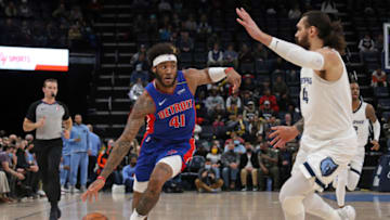 Jan 6, 2022; Memphis, Tennessee, USA; Detroit Pistons forward Saddiq Bey (41) dribbles as Memphis Grizzles center Steven Adams (4) defends during the first half at FedExForum. Mandatory Credit: Petre Thomas-USA TODAY Sports