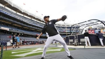 Jun 2, 2013; Bronx, NY, USA; New York Yankees shortstop Derek Jeter (2) throws during batting practice before the game against the Boston Red Sox at Yankee Stadium. Mandatory Credit: William Perlman/THE STAR-LEDGER via USA TODAY Sports