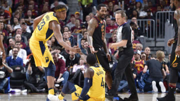 CLEVELAND, OH - APRIL 25: Myles Turner #33 of the Indiana Pacers helps Victor Oladipo #4 of the Indiana Pacers off of the flor during the game against the Cleveland Cavaliers in Game Five of Round One of the 2018 NBA Playoffs between the Indiana Pacers and Cleveland Cavaliers on April 25, 2018 at Quicken Loans Arena in Cleveland, Ohio. NOTE TO USER: User expressly acknowledges and agrees that, by downloading and/or using this Photograph, user is consenting to the terms and conditions of the Getty Images License Agreement. Mandatory Copyright Notice: Copyright 2018 NBAE (Photo by David Liam Kyle/NBAE via Getty Images)