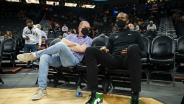 Oct 6, 2021; Phoenix, Arizona, USA; Phoenix Suns owner Robert Server (left) talks with general manager James Jones against the Los Angeles Lakers during a preseason game at Footprint Center. Mandatory Credit: Mark J. Rebilas-USA TODAY Sports