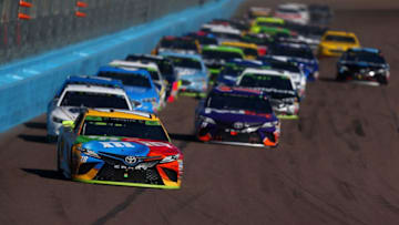 PHOENIX, AZ - NOVEMBER 11: Kyle Busch, driver of the #18 M&M's Toyota, leads the field during the Monster Energy NASCAR Cup Series Can-Am 500 at ISM Raceway on November 11, 2018 in Phoenix, Arizona. (Photo by Sarah Crabill/Getty Images)