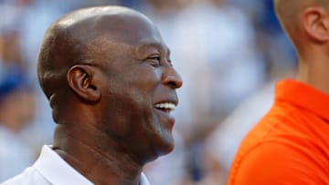 CHICAGO, IL - JULY 23: Head coach Lovie Smith of the University of Illinois football team looks on before the game between the Chicago Cubs and the St. Louis Cardinals at Wrigley Field on July 23, 2017 in Chicago, Illinois. The Chicago Cubs won 5-3. (Photo by Jon Durr/Getty Images)
